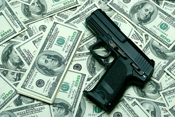 gun and money